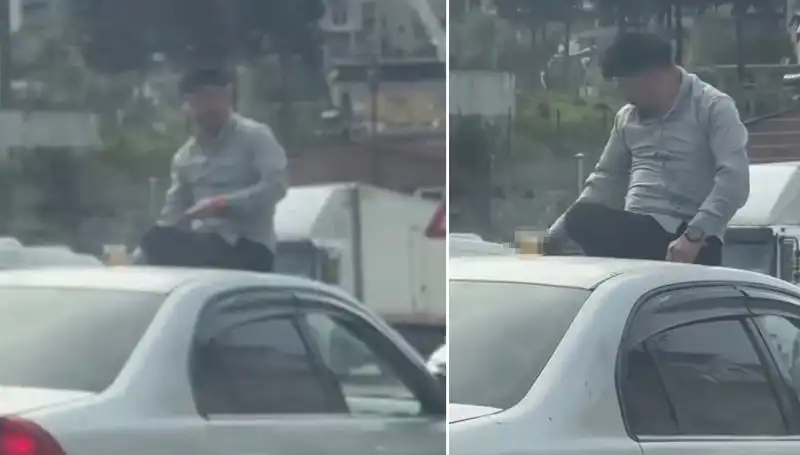 Trafikte Alemin Tek Görünümü: Otomobil Üzerinde Dans Eden Gençler